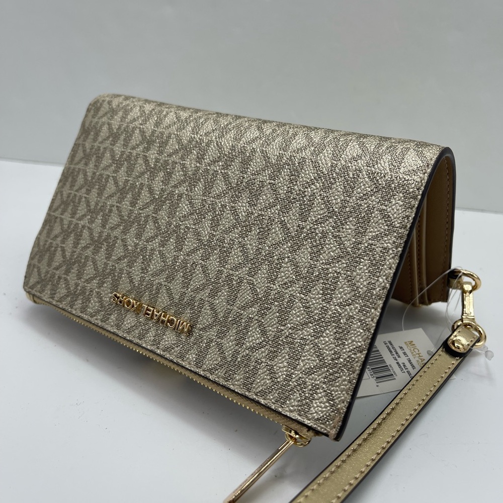 MICHAEL KORS JST Lg Double Zip Signature Logo Wristlet Wallet Phon
Pale Gold
NWT - Picture 15 of 16
